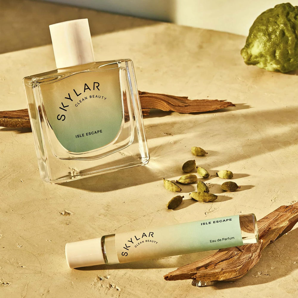 Label close-up of Skylar Isle Escape and its clean beauty promise.