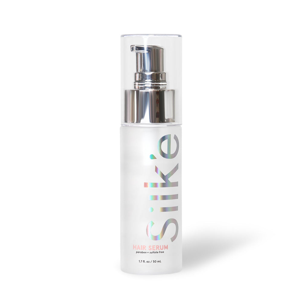 Sleek'e Silk'e serum label close-up highlighting paraben- and sulfate-free formula.
