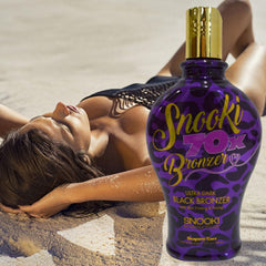 Snooki Ultra Dark 70X application gesture demonstrates even spread for a uniform tan.