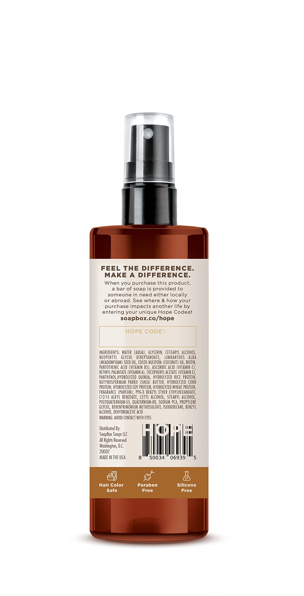 Fine mist from Soapbox Mane Tamer applied to hair for smooth hydration.