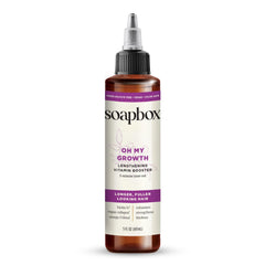 Soapbox Oh My Growth bottle pour highlights a lightweight, non-greasy formula for easy application.