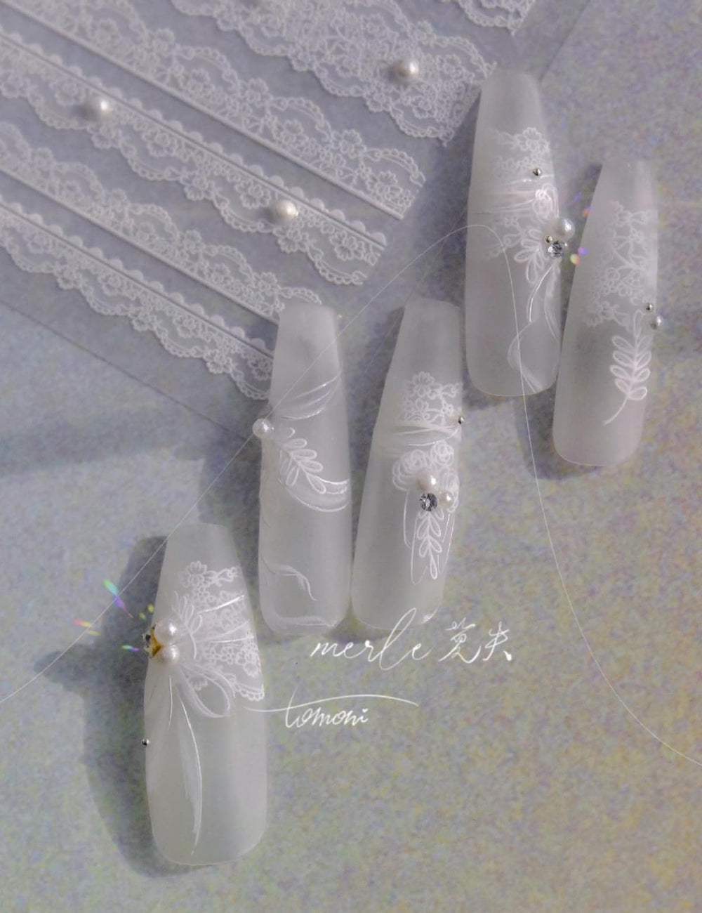 SOFTSOUL 5D embossed pearl on natural nail for durable, salon-like finish.