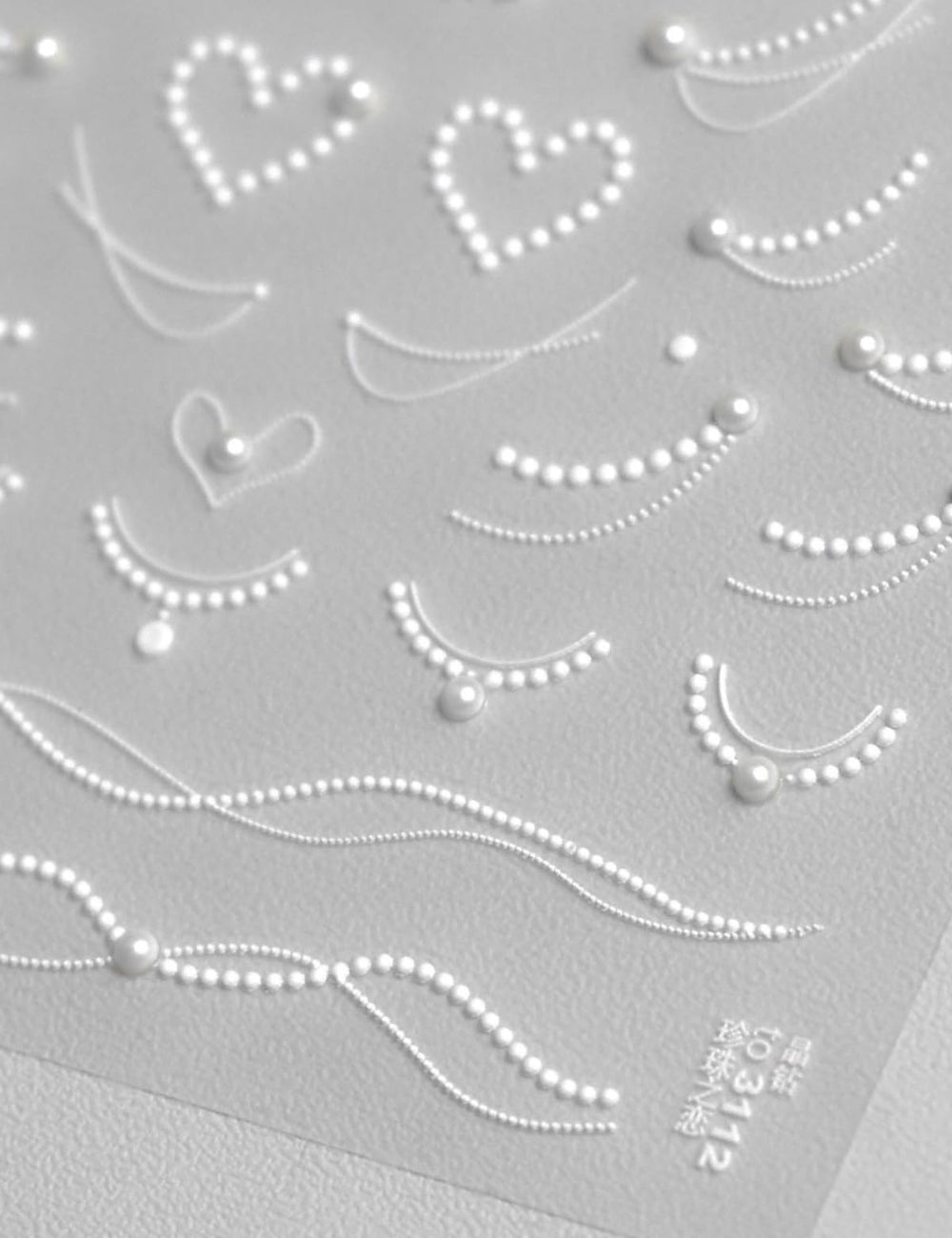 SOFTSOUL nail art stickers offer long-lasting shine when sealed with top coat.
