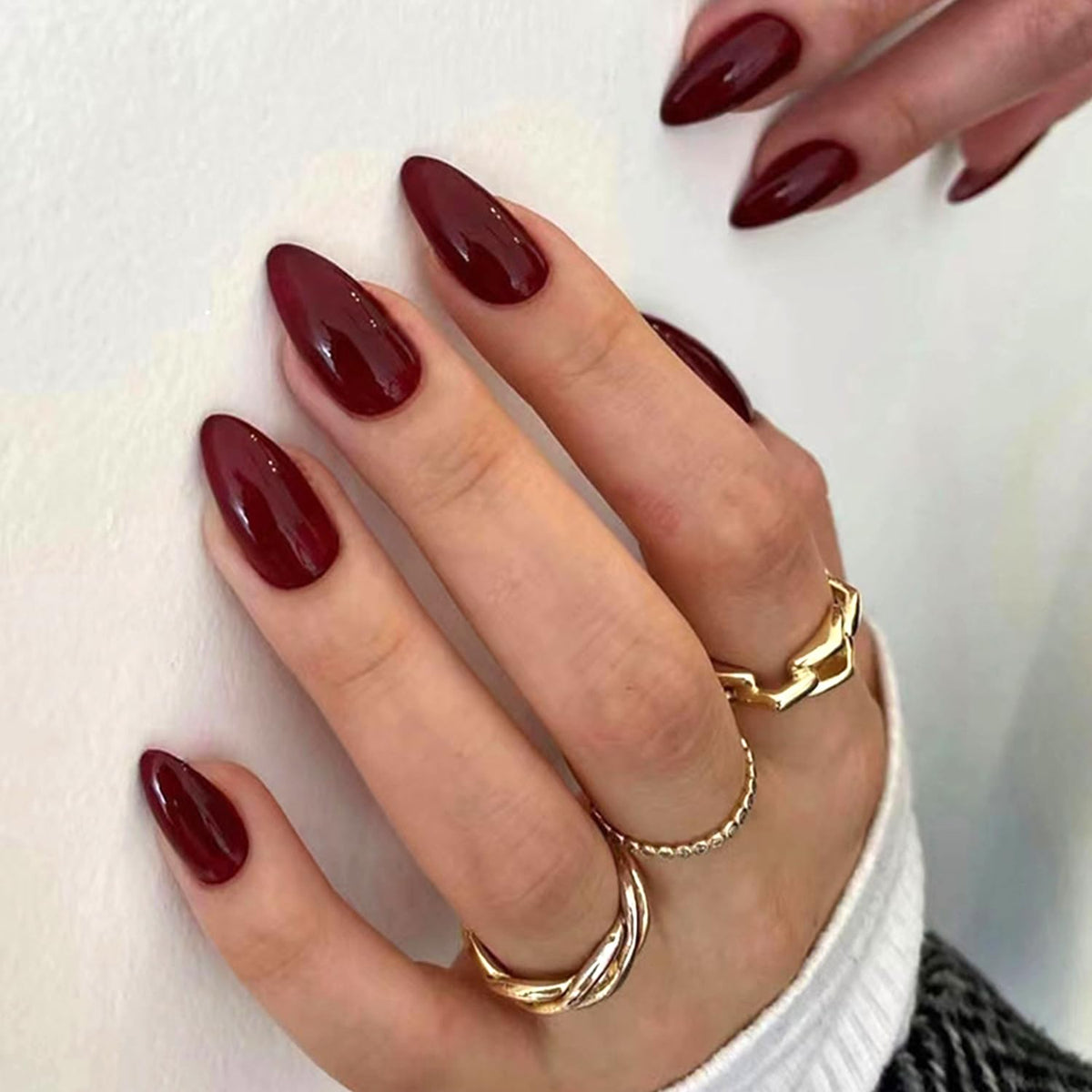 Wine Red press-on nails in medium almond shape for quick daily manicure