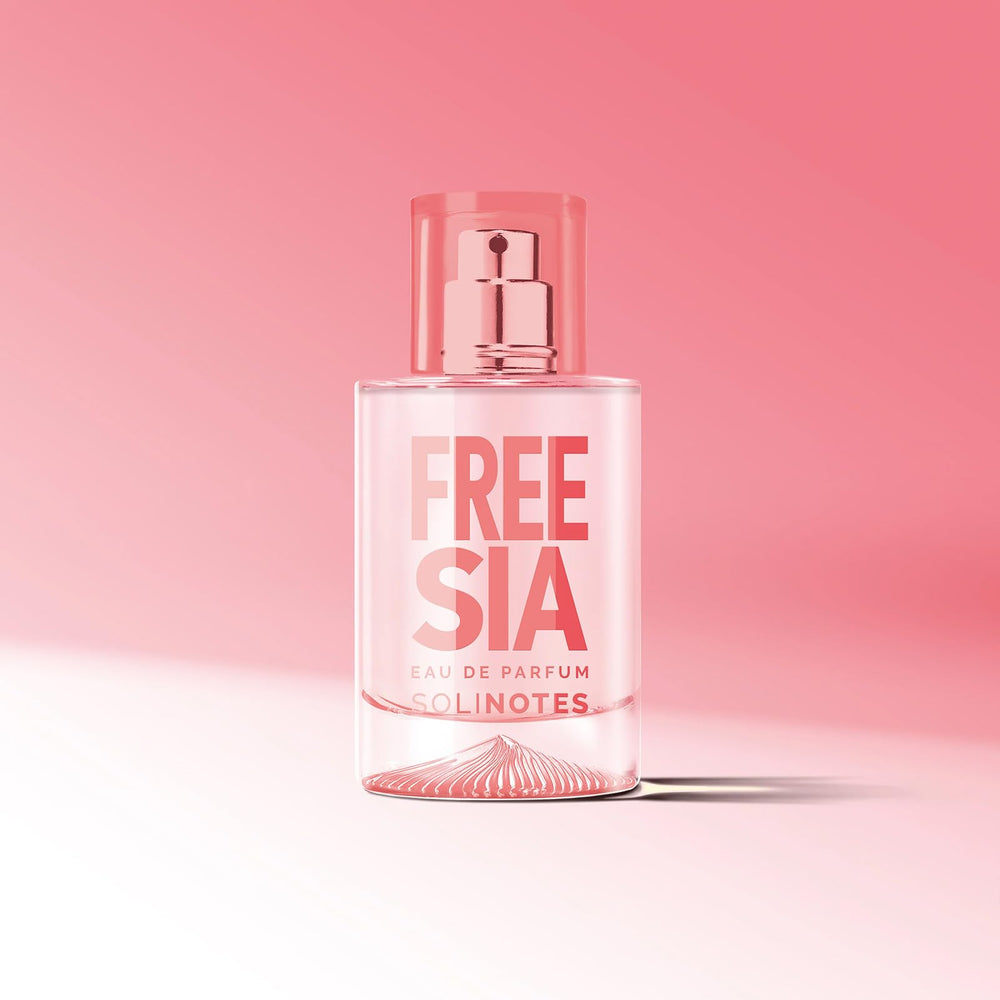 Solinotes Freesia bottle shown on a desk for everyday wear