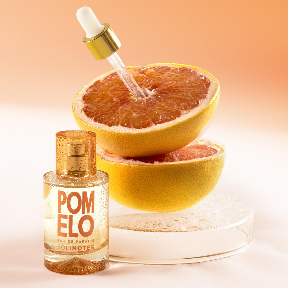 Solinotes Pomelo with jasmine and melon heart for a joyful aura.