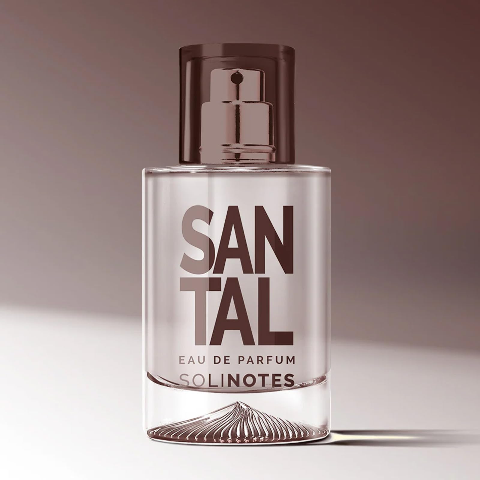 Santal EDP bottle with warm tones, ideal evening wear.