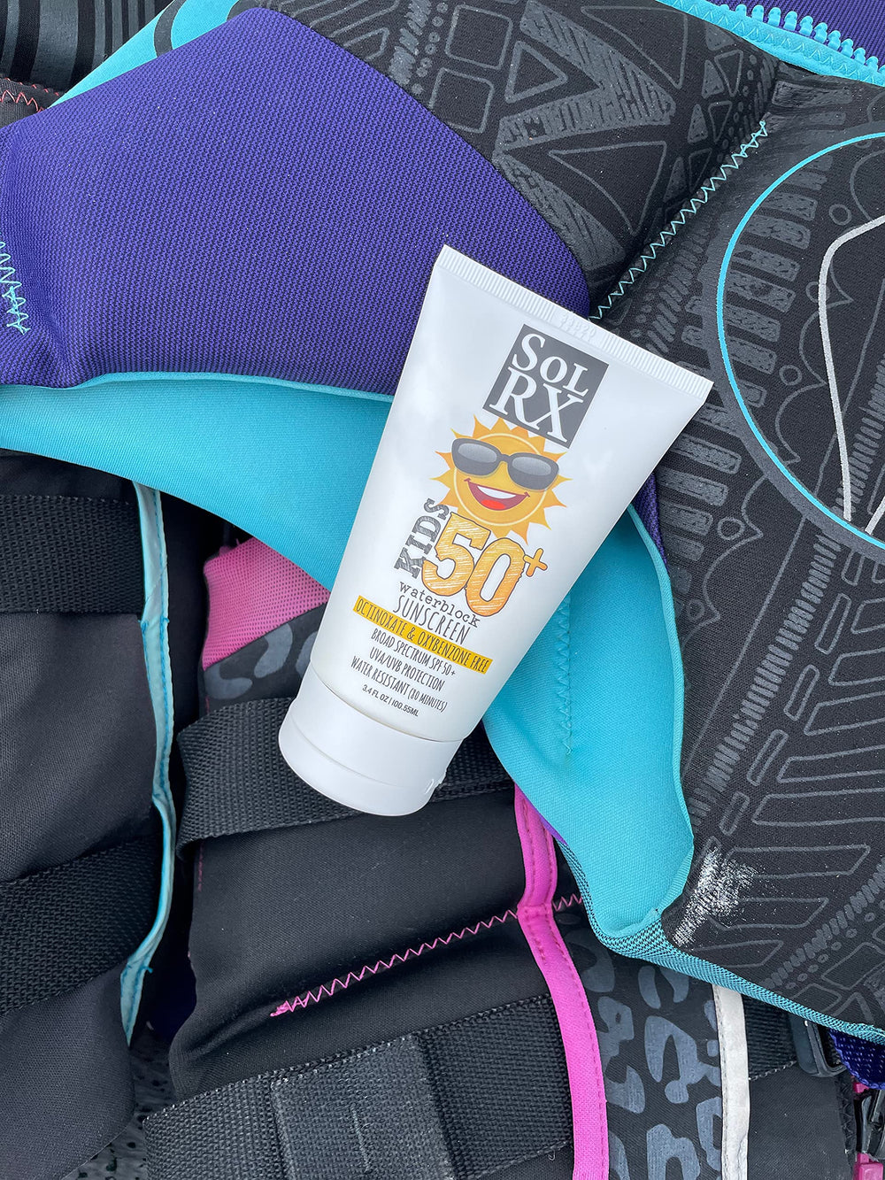 SolRX KID'S SPORT in-use during swimming highlights water resistance for play.
