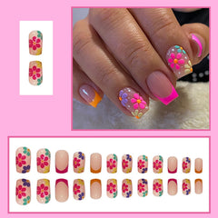 SOOZEE nude-pink nails featuring floral art close-up for delicate style.