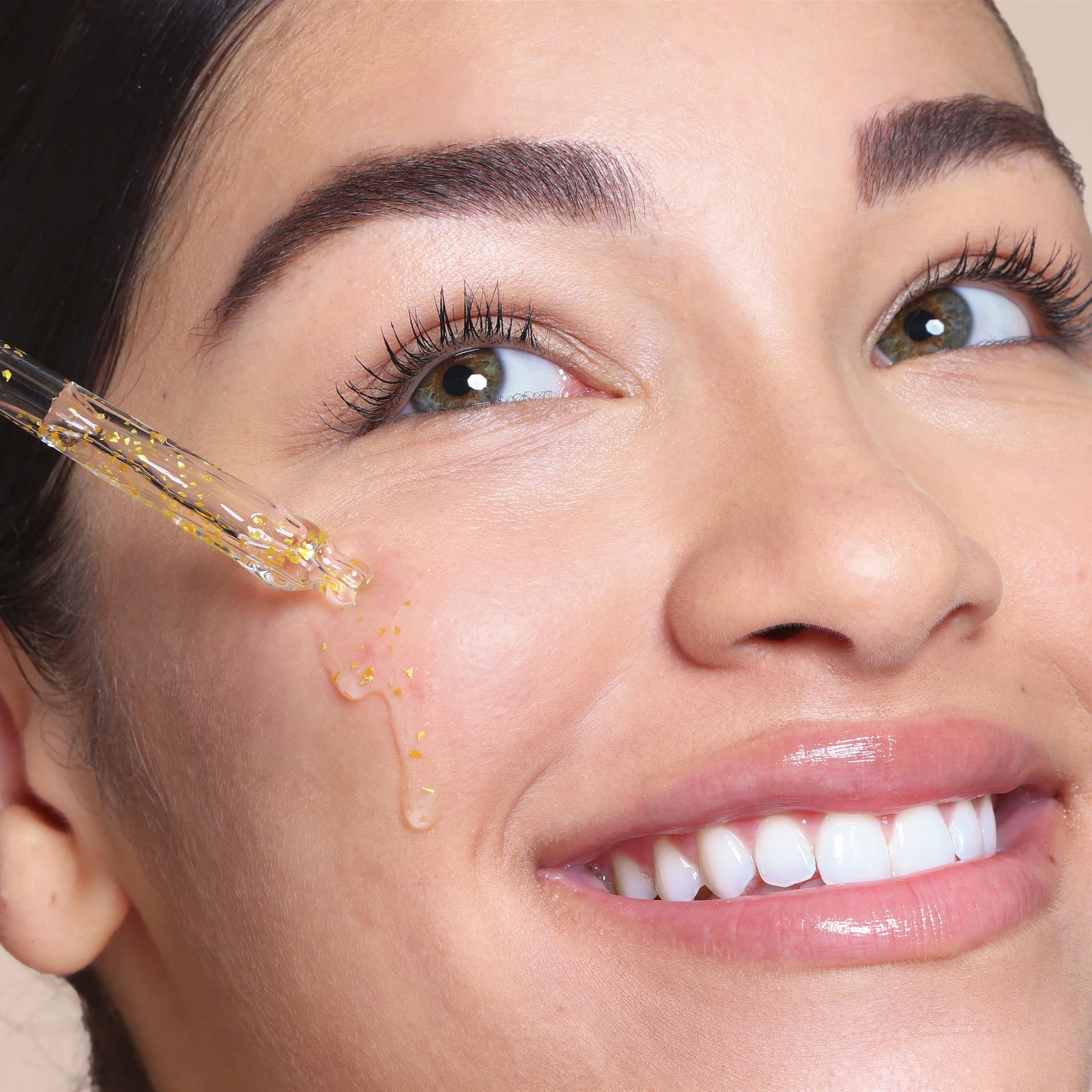 SpaLife 24k gold flakes illuminate the complexion in the serum
