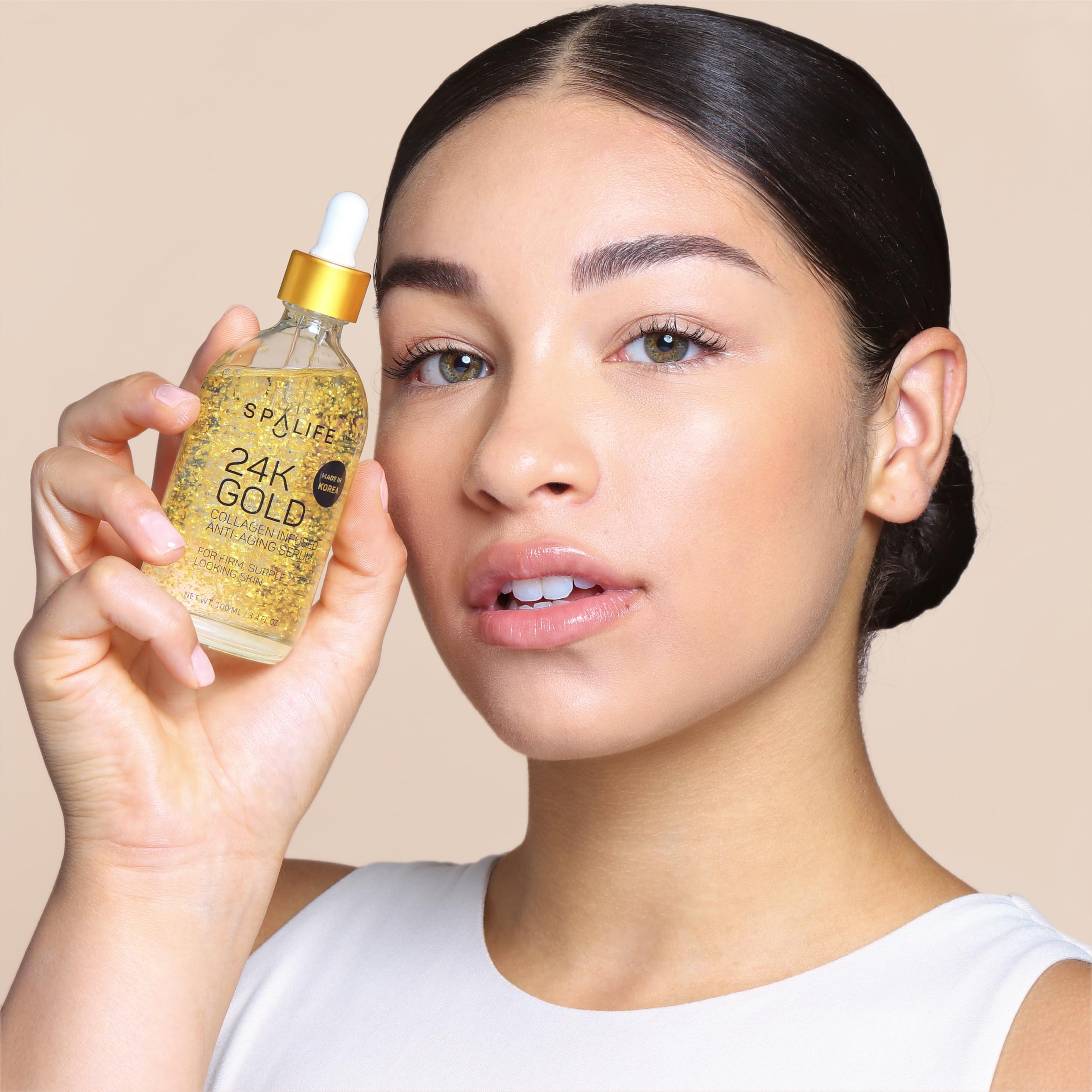 SpaLife face application on skin showing smooth, non-greasy absorption.