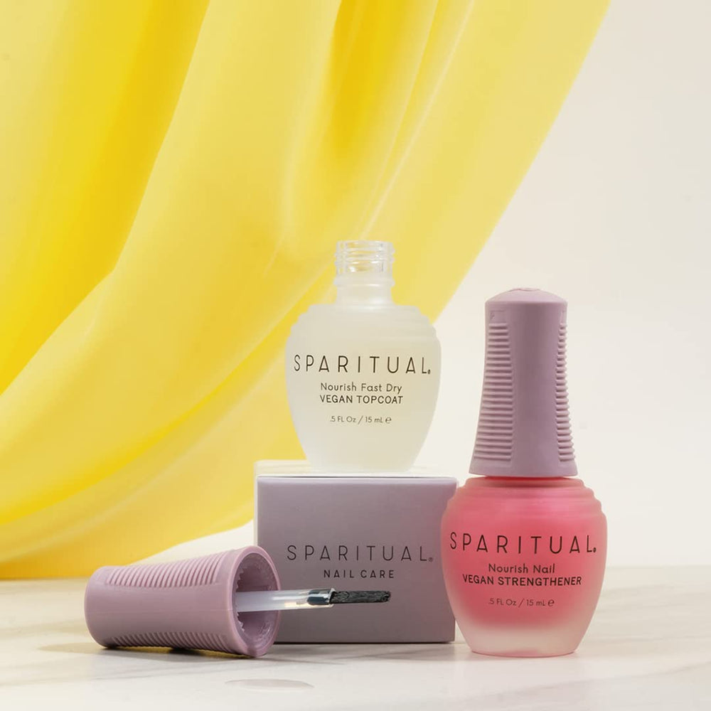 SpaRitual Nourish Nail Strengthener coating on nails to boost elasticity and resilience