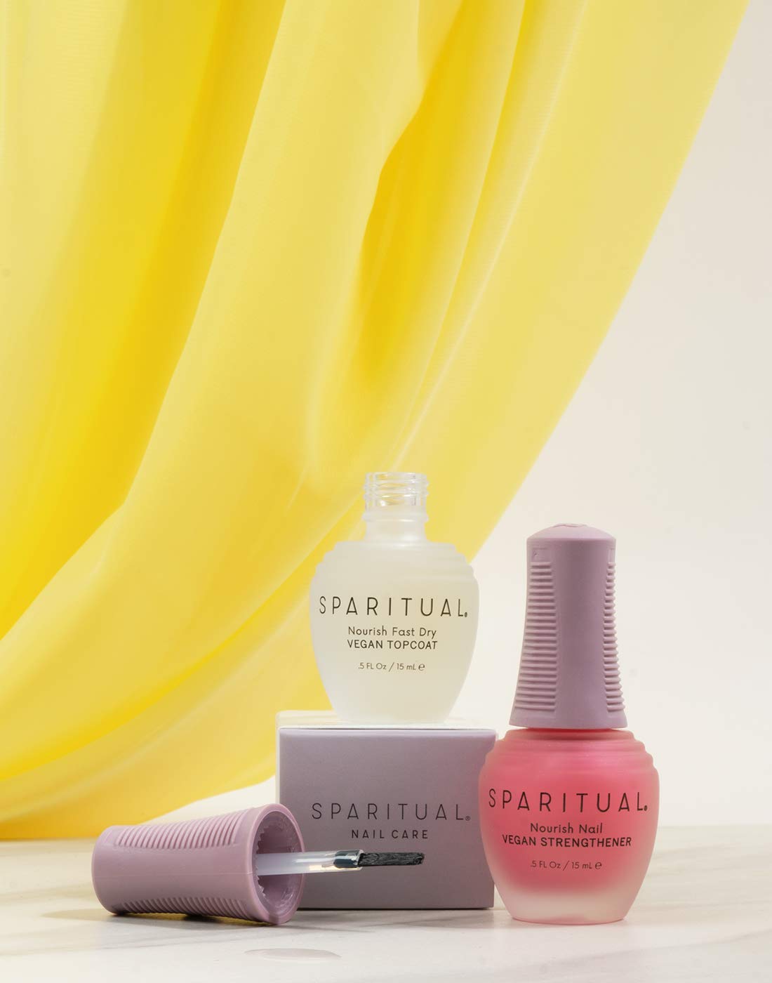 SpaRitual Nourish Nail Strengthener packaging highlighting vegan formula and 0.5 oz size
