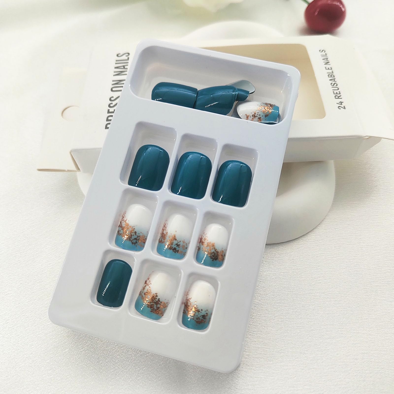 SRIMNUYY 24‑piece press-on nail kit in a box for easy storage.