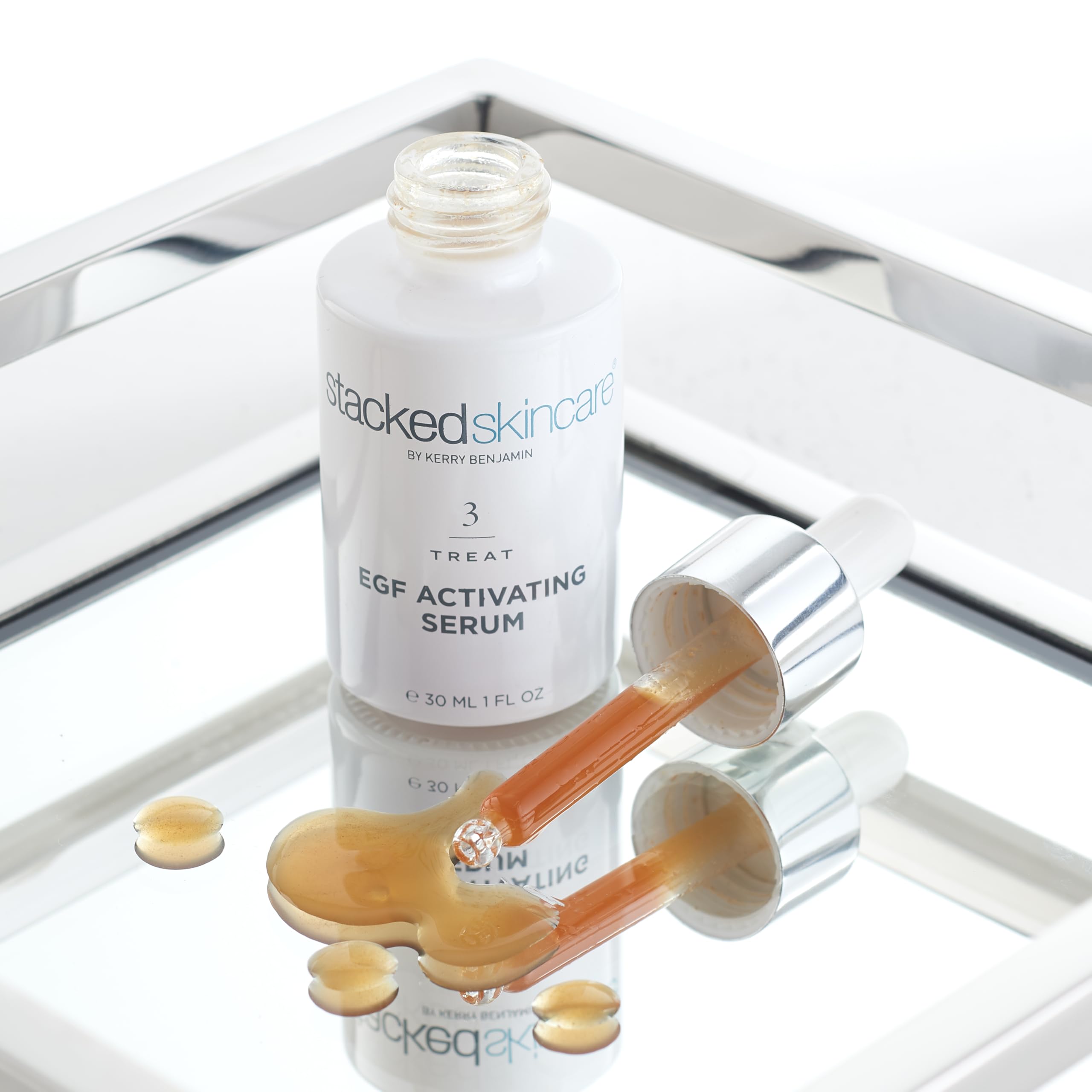 StackedSkincare Hydrating EGF Serum pump closeup shows quick absorption.