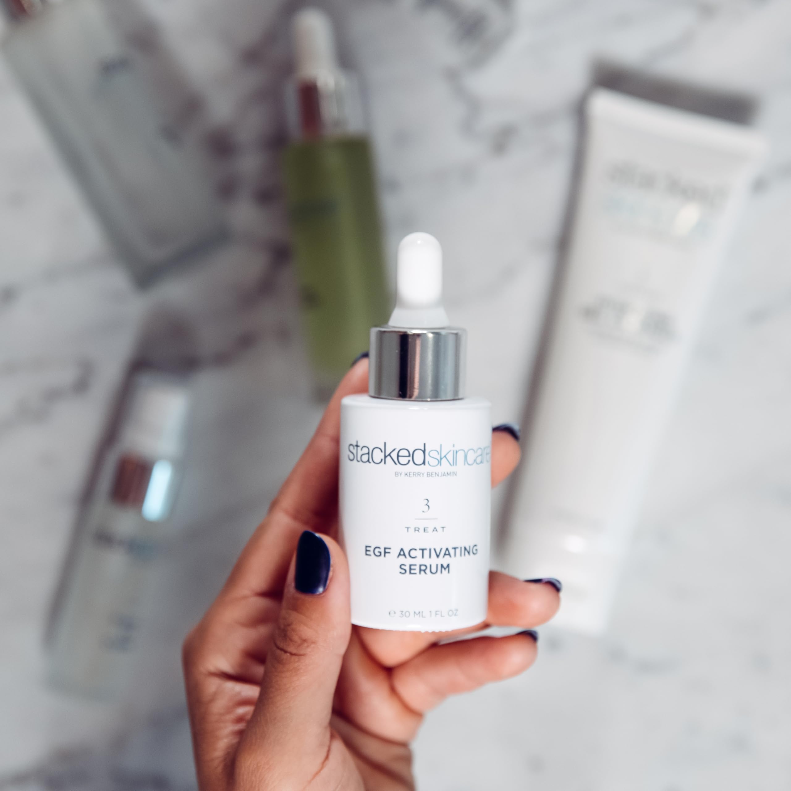 StackedSkincare Hydrating EGF Serum texture closeup suggests refined skin texture.