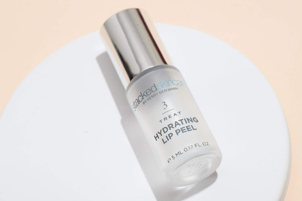 StackedSkincare lip primer application scene for smoother lips.