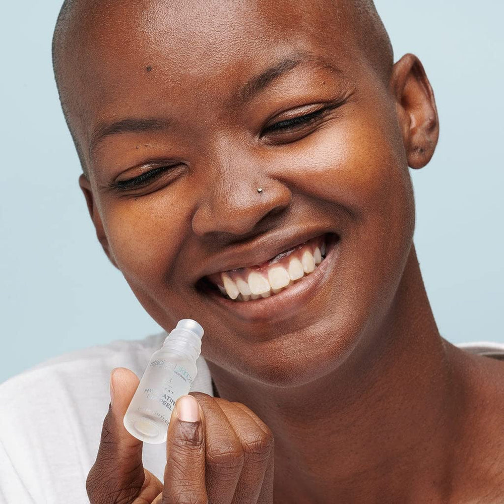 StackedSkincare lip treatment moisturizer demonstrating dual-action hydration.