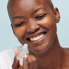 StackedSkincare lip treatment moisturizer demonstrating dual-action hydration.