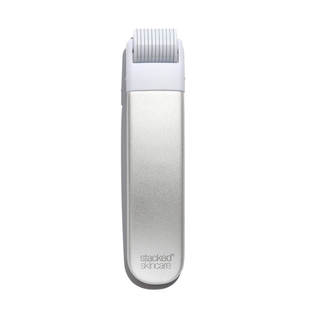 StackedSkincare microneedling roller with replaceable head for at-home skin refinement