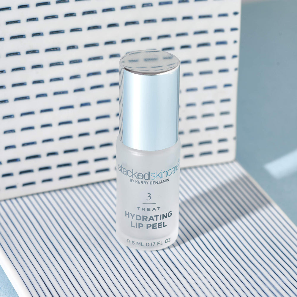 StackedSkincare night lip treatment on lips indicating overnight hydration.