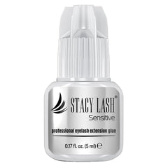 STACY LASH Sensitive glue bottle close-up showing low fumes and professional use