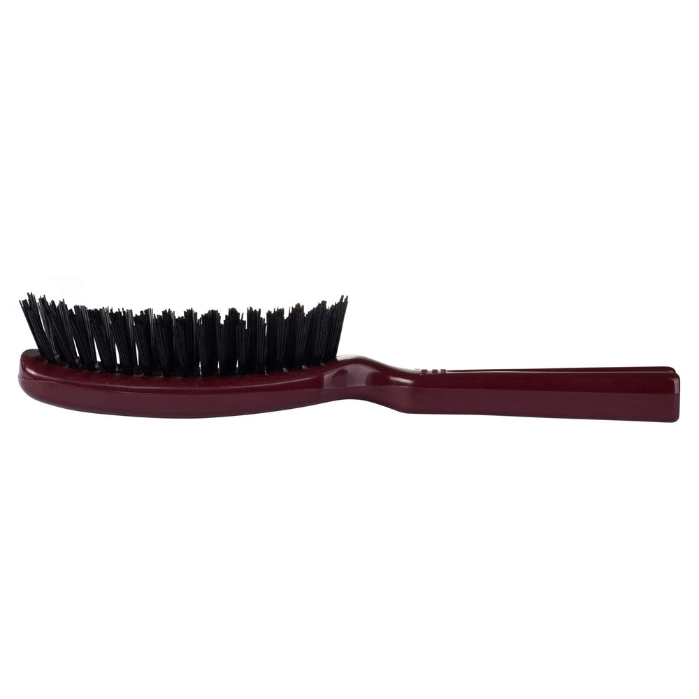 Stanley Commander hairbrush used on dry hair with multi-length bristles for better penetration