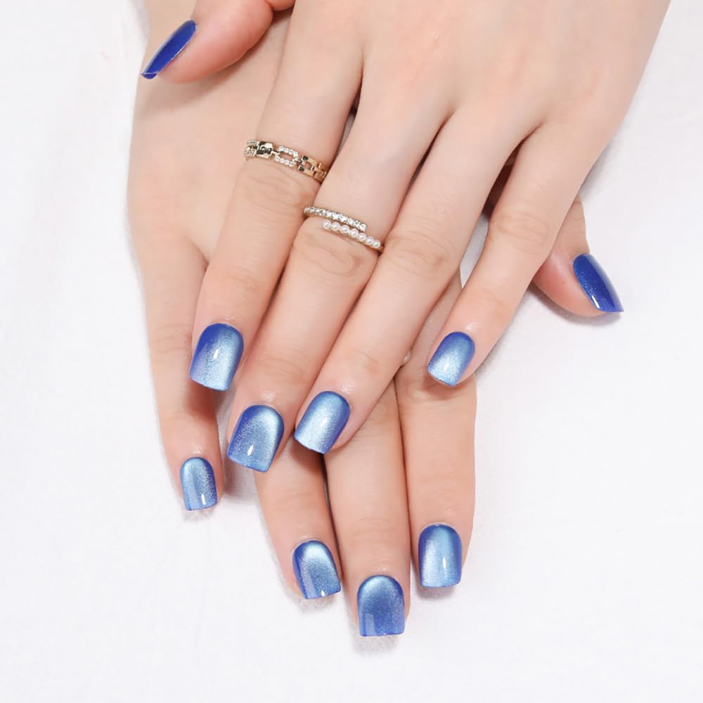 Stbisen cat-eye ice blue nails with glossy finish for a glamorous party look.