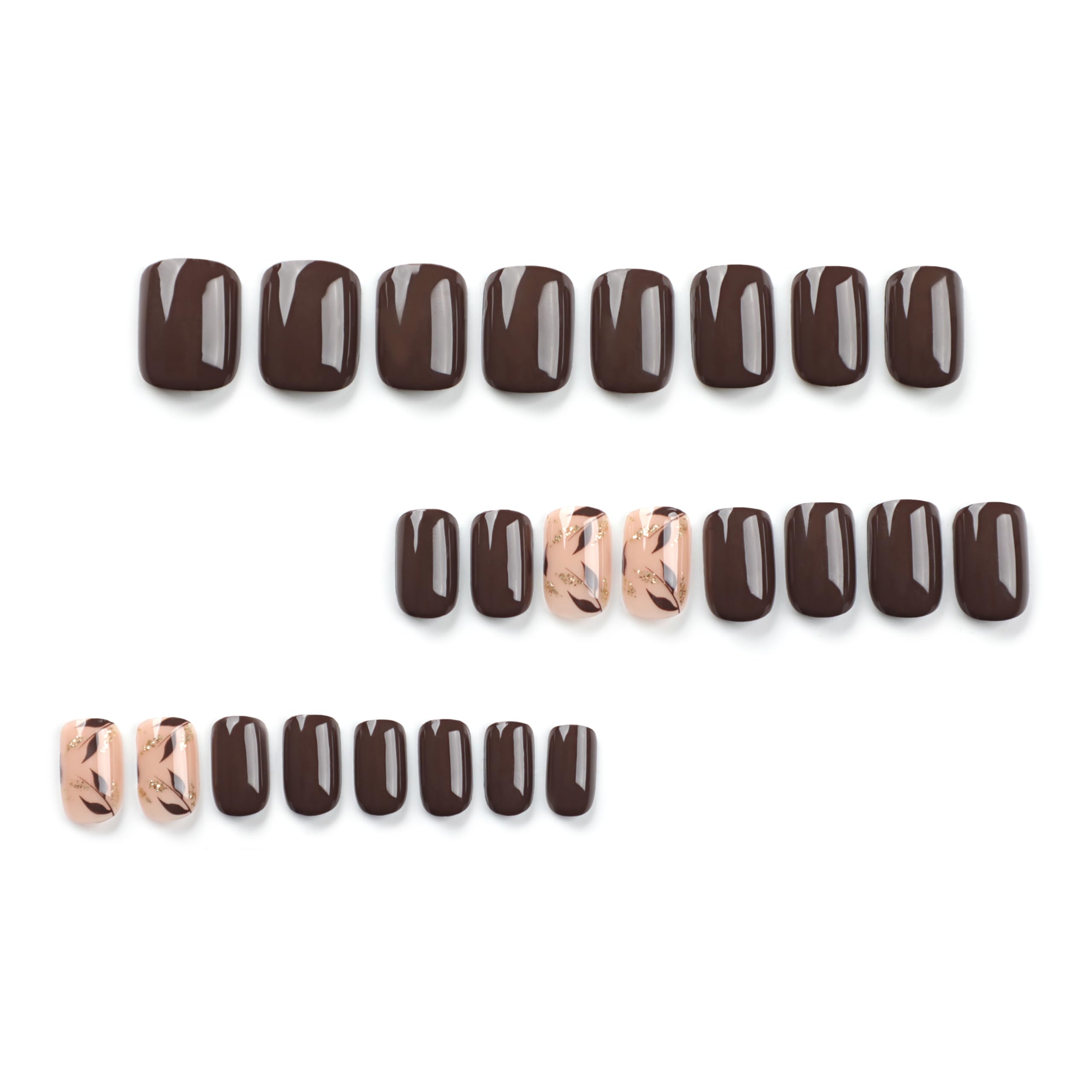 Stbisen nails with gold leaf accents for luxe styling close-up.