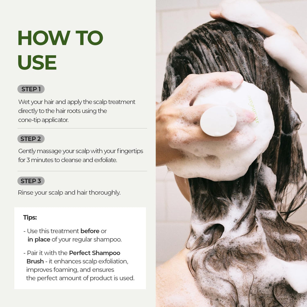 Steambase Tea Tree Scalp Water Scaler bottle with droplets.