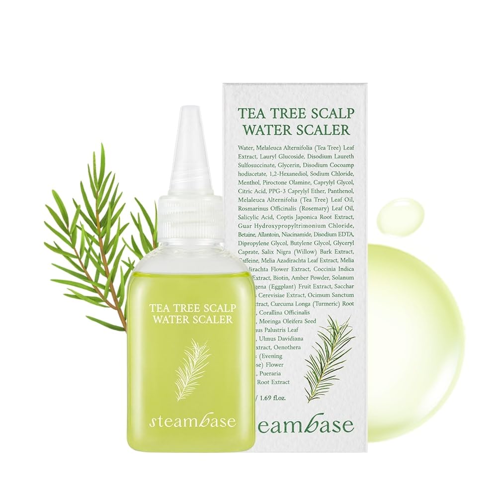 Steambase Tea Tree Scalp Water Scaler bottle pour for precise scalp cleansing.