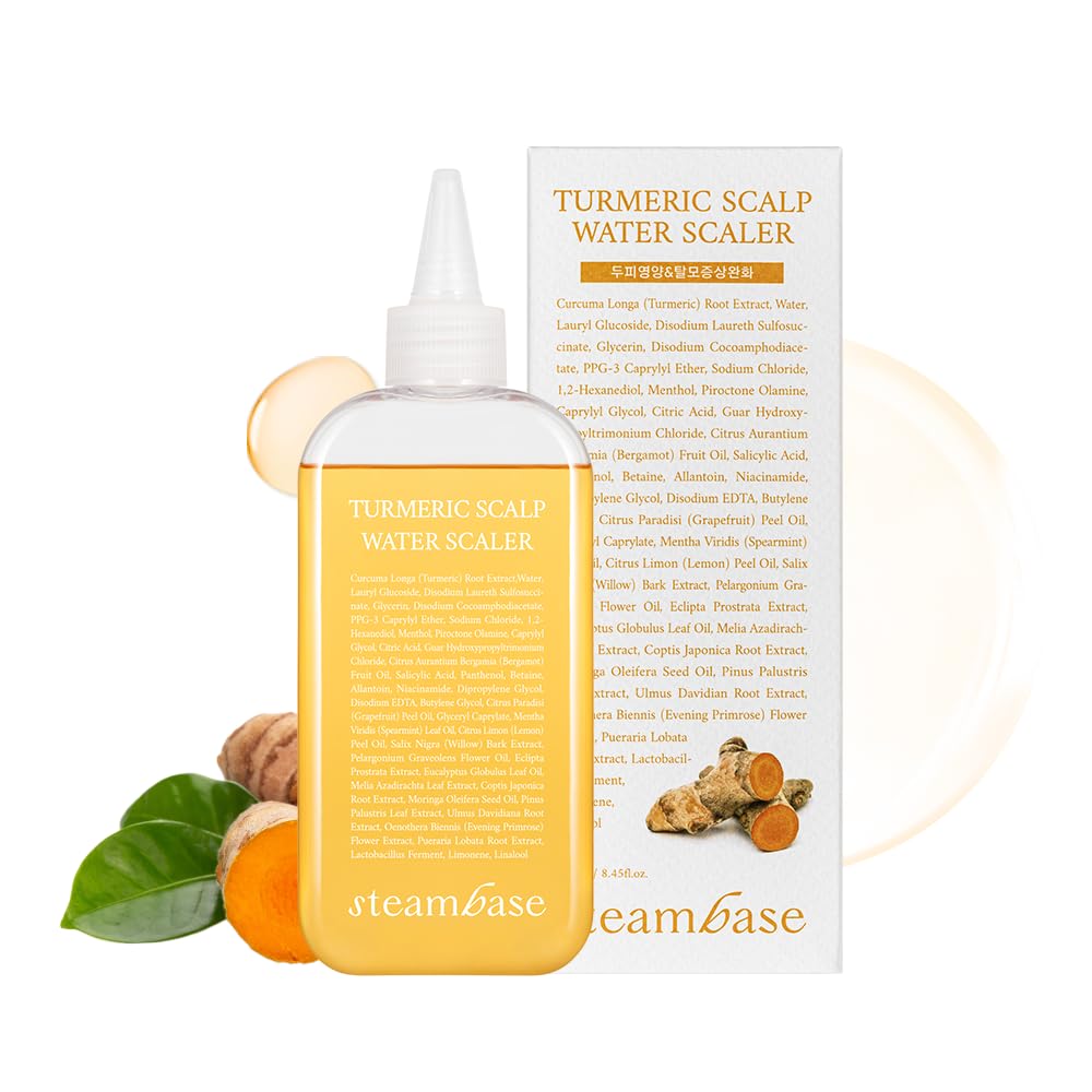 STEAMBASE Turmeric Scalp Water Scaler bottle pour for precise cleansing and scalp refreshment.