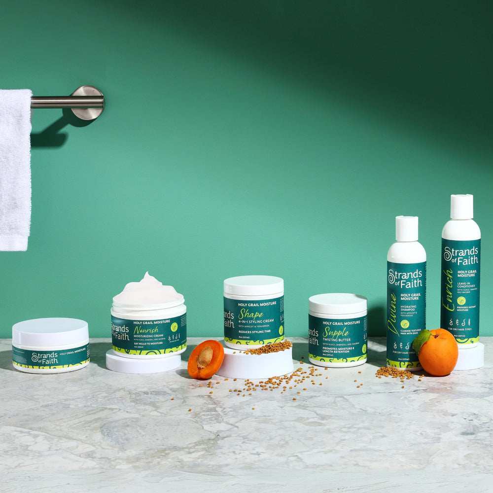 Strands of Faith Enrich Leave-in Conditioner applied from roots to ends on hair.