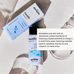 Stratia Fortify oil ingredients blend highlighting camellia, tamanu, and marula for nourishment.