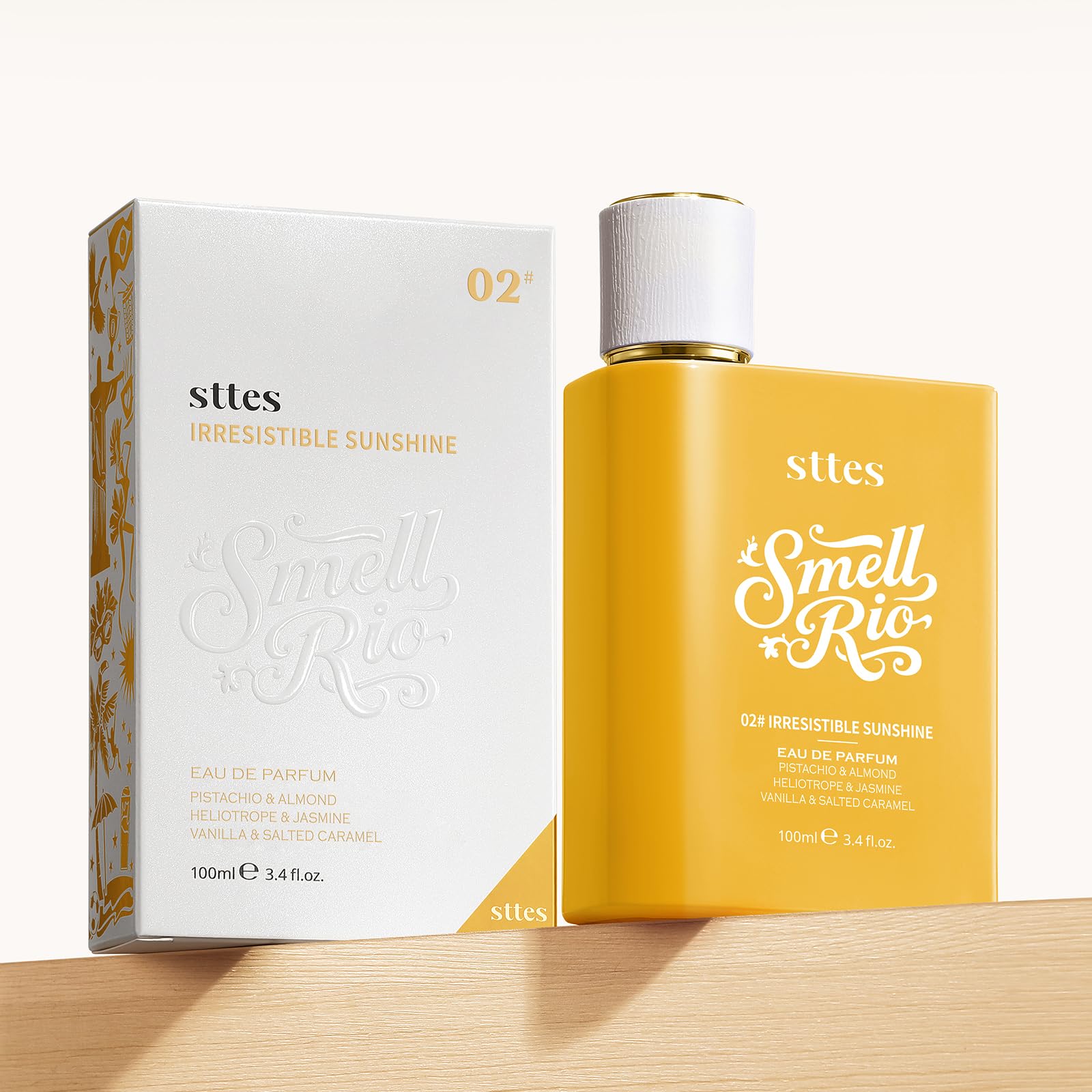 Sttes Perfume 02 Irresistible Sunshine 100ml bottle displayed on vanity.