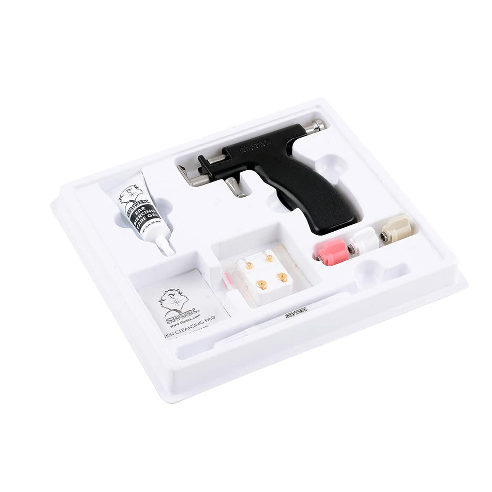 Studex marker gel usage closeup shows clean, guided dots for accurate piercing marks.