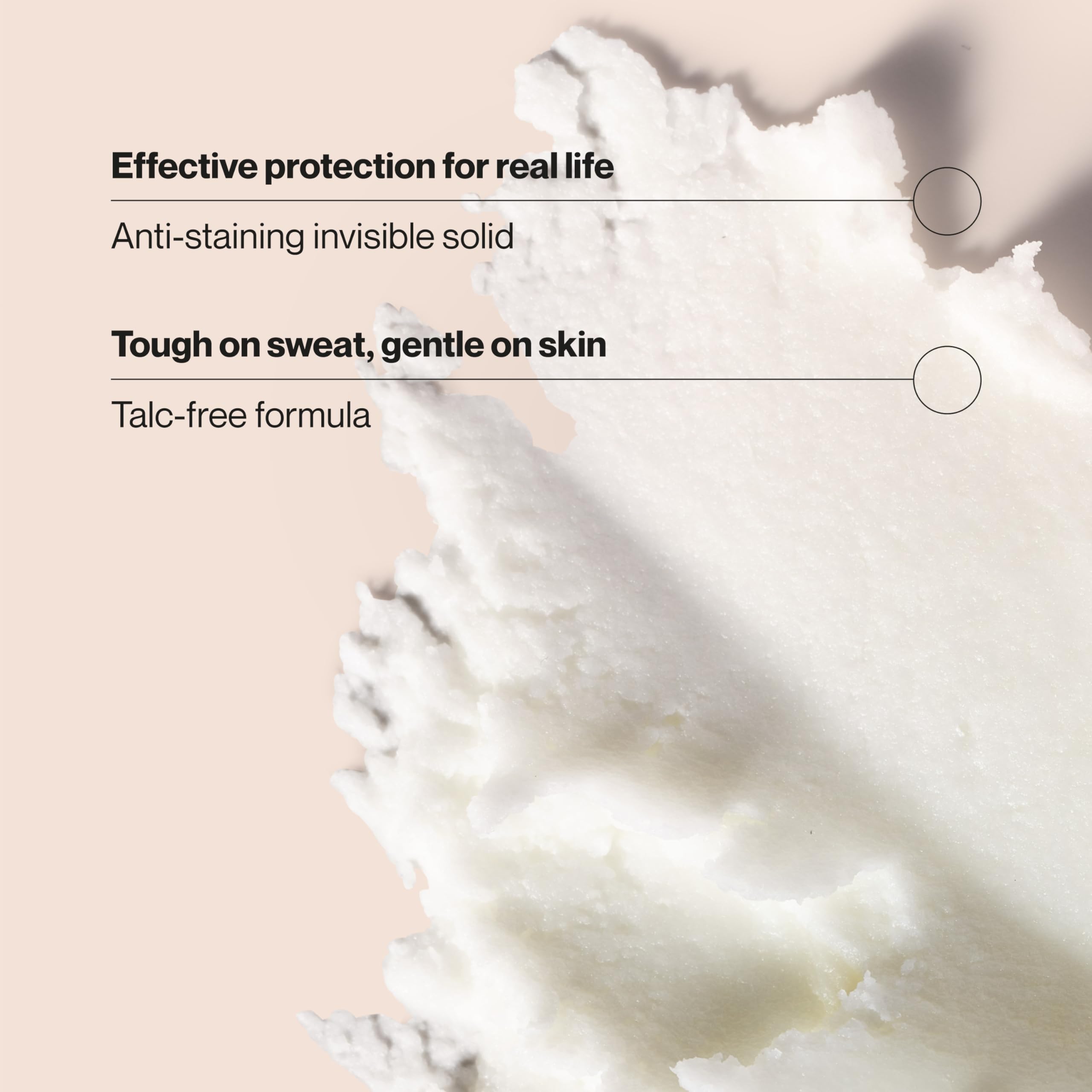 Close-up of applying Suave deodorant-stick on clean skin.