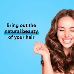 Suave Essentials Hydrating Conditioner bottle delivers moisture without weighing hair down.