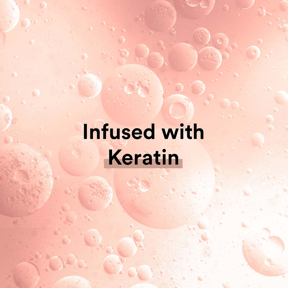 Pack of four Suave Keratin Infusion Conditioners for family use.