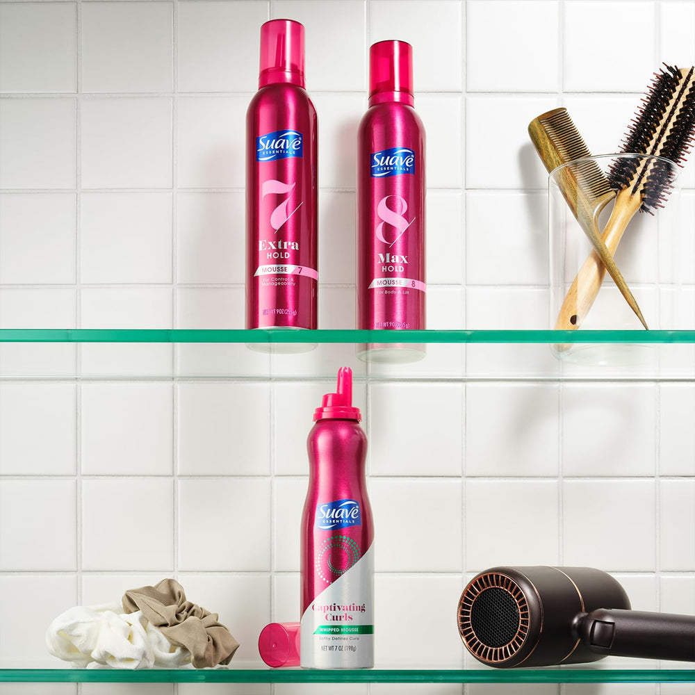 Suave mousse applied to damp hair for easy styling and control.