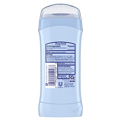 Suave Tropical Paradise stick applying underarm for all-day freshness.