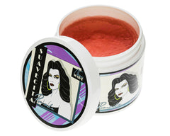 Hair being styled with Suavecita pomade to tame frizz and add shine.