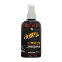Suavecito Bay Rum Aftershave bottle, soothing post-shave hydration.