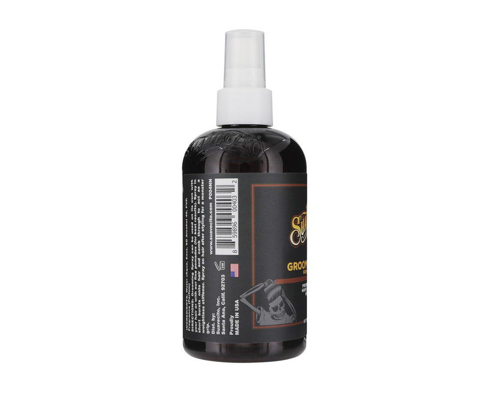 Suavecito grooming spray before pomade on damp hair for enhanced hold.