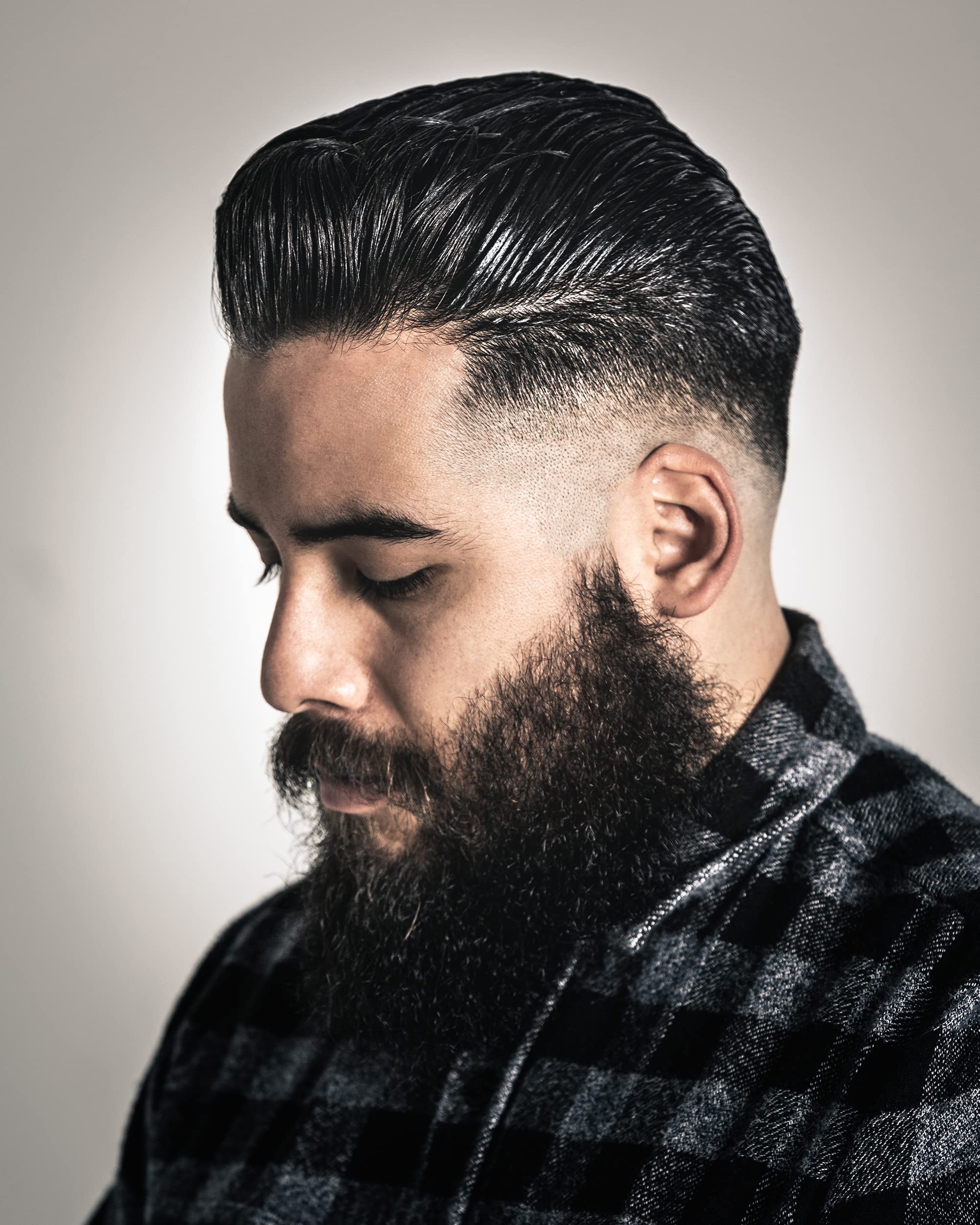 High-shine finish from Suavecito pomade adds depth and polish.