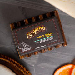 Bar resting on skin shows moisturizing performance after cleansing.