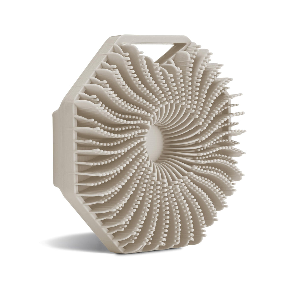 Sud Scrub antimicrobial silicone body scrubber product shot with hygienic surface