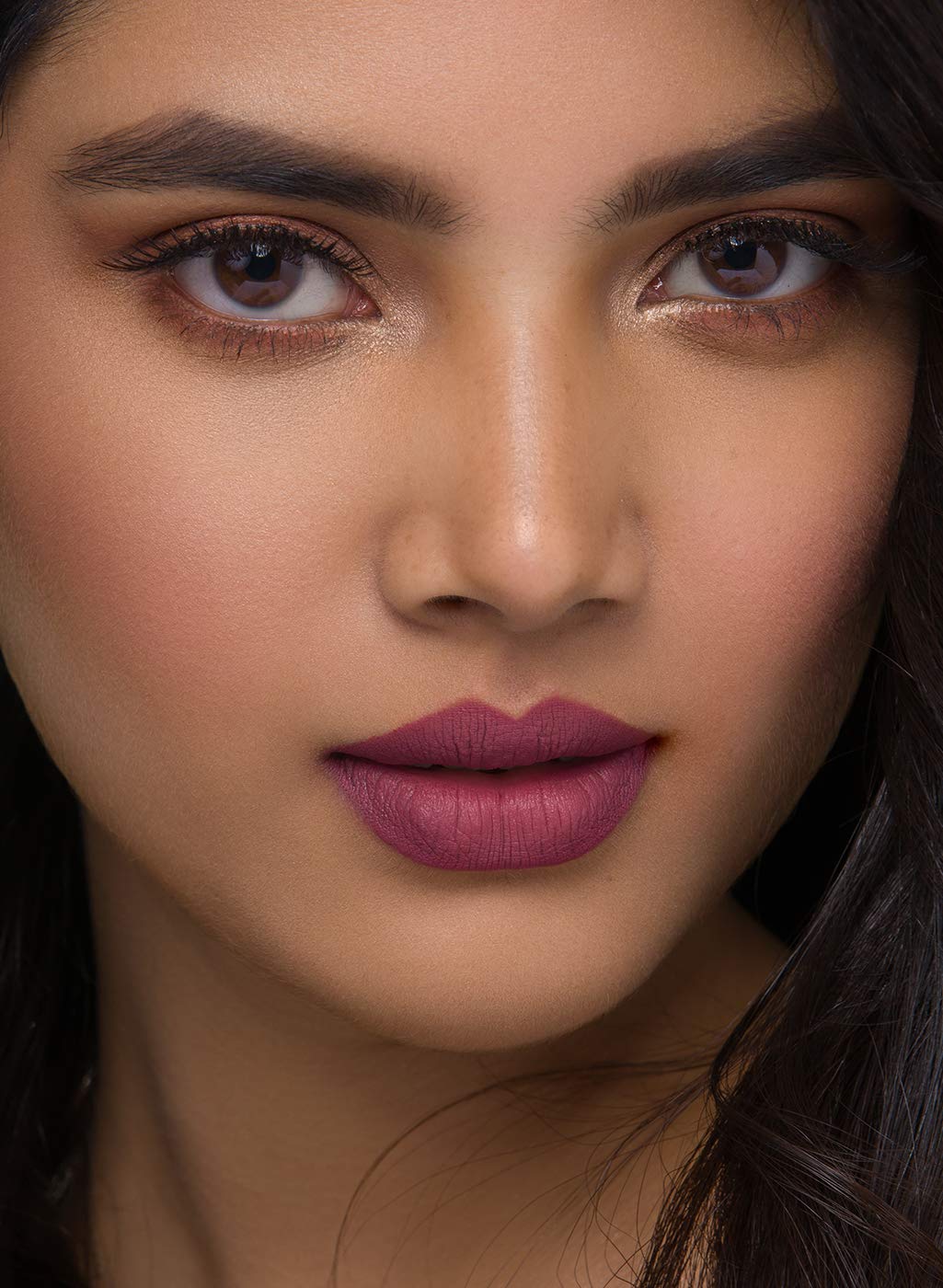 SUGAR lip crayon on lips with long-wear matte finish