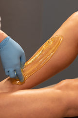 SUGARED + BRONZED at-home waxing setup with warm paste ideal for thick hair.