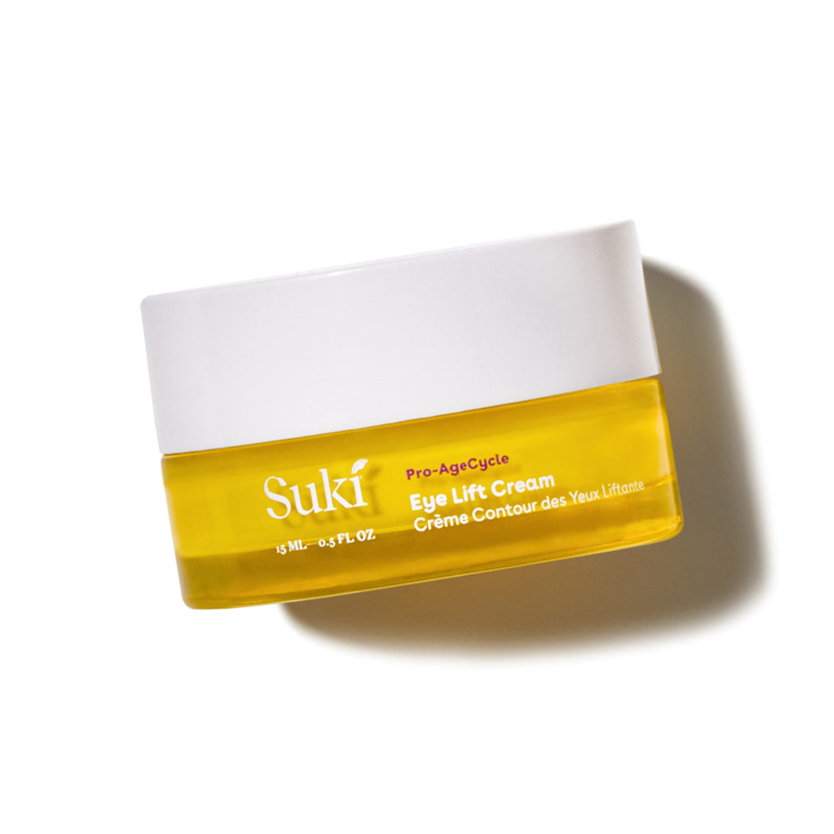 Suki Eye Lift Renewal Cream Day bottle; lightweight formula brightens under-eye skin.